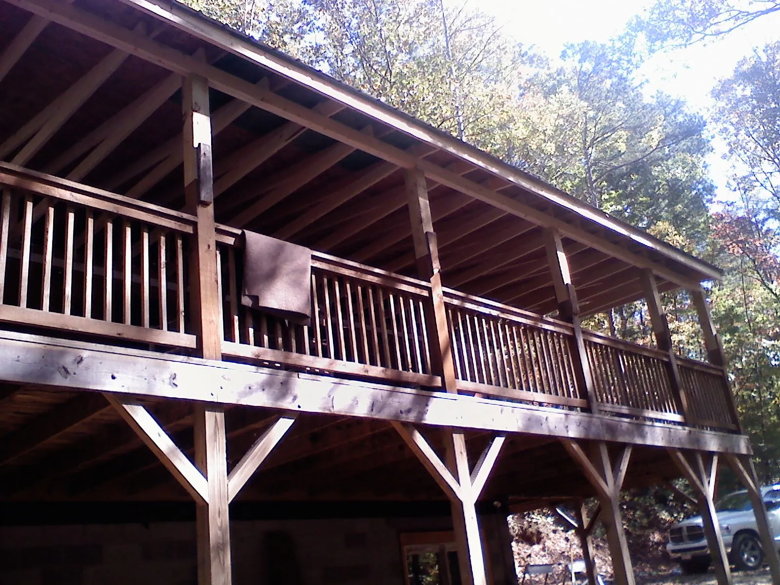 Timber framing under a new elevated porch and deck — Roof Leak Repair in Weedsport by Roofing Brothers